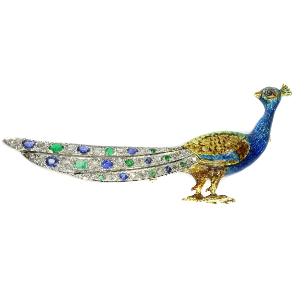 Charming peacock brooch enameled with a tail set with diamond sapphire emerald